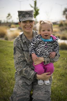 Tech. Sgt. Jamie Meadows-Valley with adopted daughter Sandie